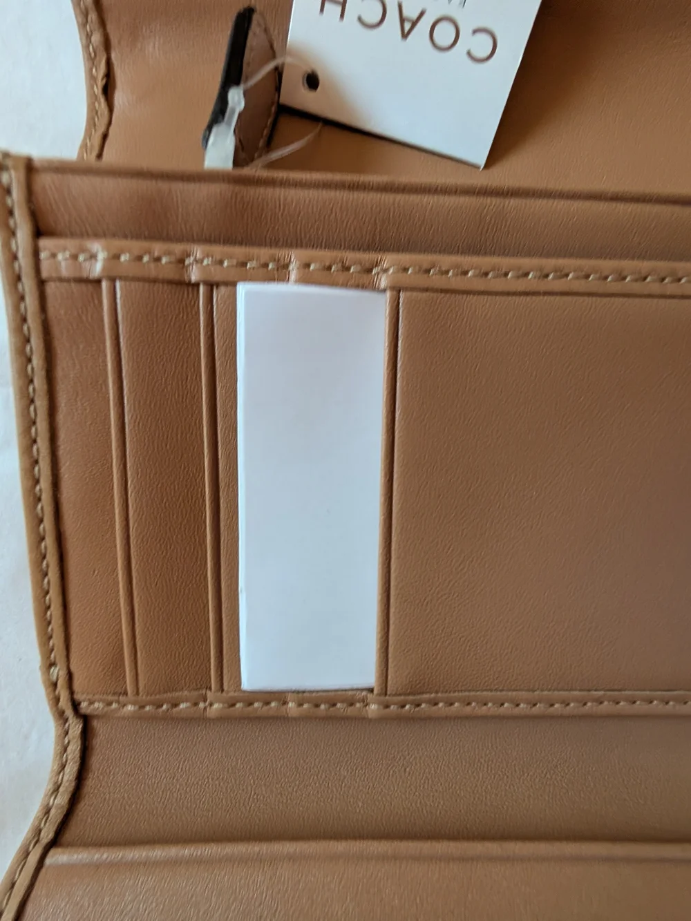COACH Men’s Signature Canvas Trifold Wallet in Brown/Tan